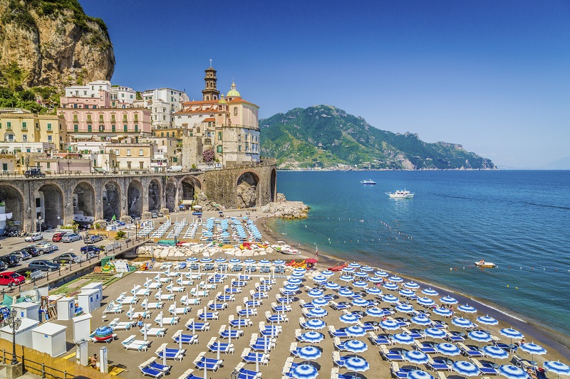 Scenic picture-postcard view of the beautiful town of Atrani at famous Amalfi Coast with Gulf of Salerno, Campania, Italy.