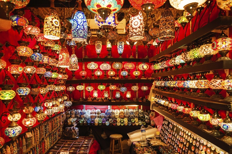 Oriental turkish lamps and lanterns exposed into a red bazaar at Istanbul market