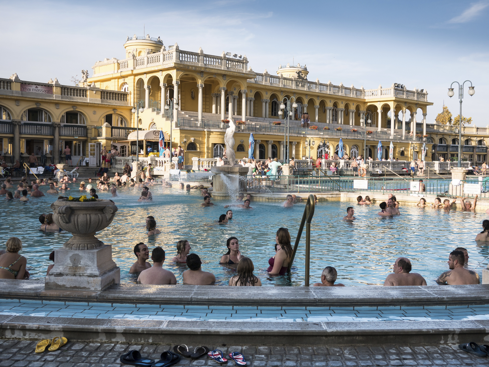 Budapest, Hungary - October 27, 2013: Bathers at the Szechenyi Thermal Baths, Budapest, Hungary. Taken in October on a sunny day.